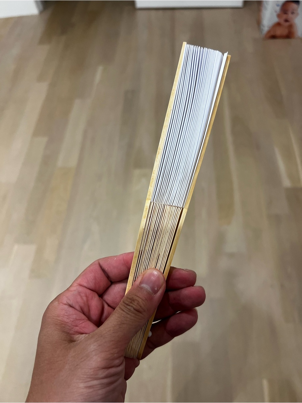 Handheld Folding Fan in White and Natural Wood - Picture 5 of 5